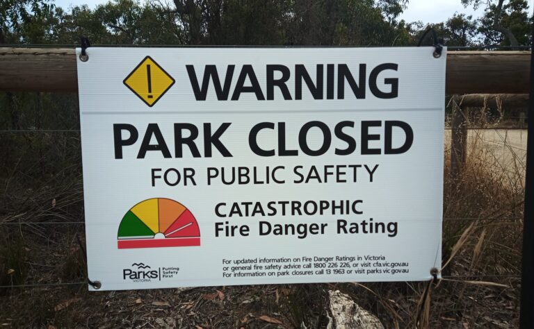 Sign saying 'Warning park Closed for Public Safety" on a catastrophic fire day