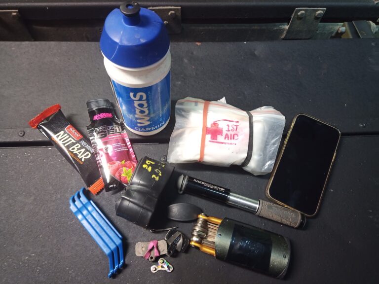 Some essential tools, 1st aid kit, drink and snacks.