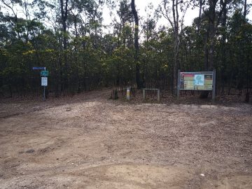 Blores Hill Trailhead showing entrance to tracks and info board